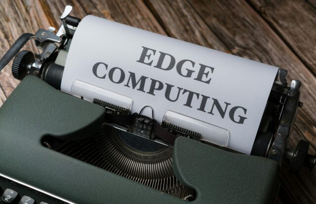 Typewriter with "EDGE COMPUTING" typed on piece of paper. It's ironic!